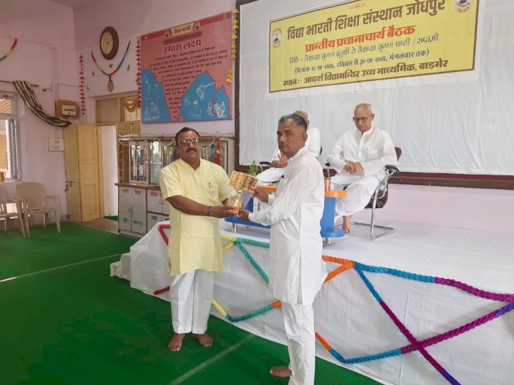 principal charan of adarsh vidya mandir raniwada honored